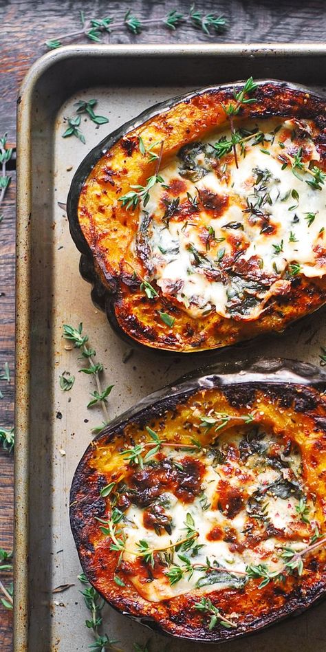 Stuffed Acorn Squash with Creamy Spinach and Cheese on a baking sheet Italian Acorn Squash Recipes, Fall Meal Vegetarian, Gluten Free Recipes For Dinner Vegetarian, Delish Keto Recipes, Main Dish Ideas For A Party, Sliced Butternut Squash Recipes, Baked Stuffed Squash, Fall Stuffing Recipes, Salad With Acorn Squash