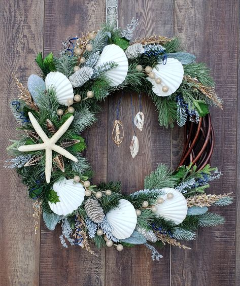 Coastal Christmas Wreath Ideas, Beach Christmas Wreath Diy, Hawaiian Christmas Wreath, Nautical Christmas Decor Diy, Beach Themed Wreaths Diy, Coastal Mantle Decorating Ideas, Beach Christmas Wreath, Coastal Winter Decor, Coastal Christmas Wreaths