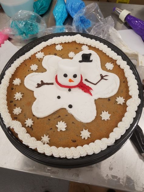 Birthday Cookie Cakes Decorated, Melted Snowman Cake, Labor Day Cookie Cake Ideas, Melting Snowman Cake, Giant Christmas Cookie, Decorated Cookie Cake Ideas, Winter Cookie Cake Ideas, Holiday Cookie Cake, Christmas Cookie Cakes Decorated