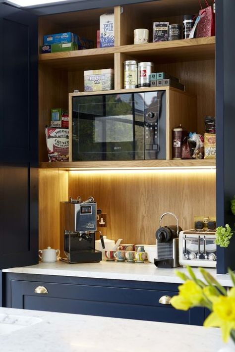 Microwaves in the Kitchen: Hidden Storage Solutions | Apartment Therapy Breakfast Bar Kitchen Wall Cabinets, Coffee Breakfast Station, Hidden Breakfast Station, Kitchen Breakfast Station, Breakfast Cupboard Coffee Stations, Breakfast Cabinet Kitchen, Breakfast Station Ideas, Microwave Hidden, Microwave Station