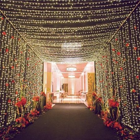 Wedding Gate Decoration, Fairy Lights Wedding Decorations, Indian Wedding Decorations Receptions, Wedding Gate, Reception Stage Decor, Fairy Lights Wedding, Gate Decoration, Wedding Background Decoration, Wedding Reception Backdrop