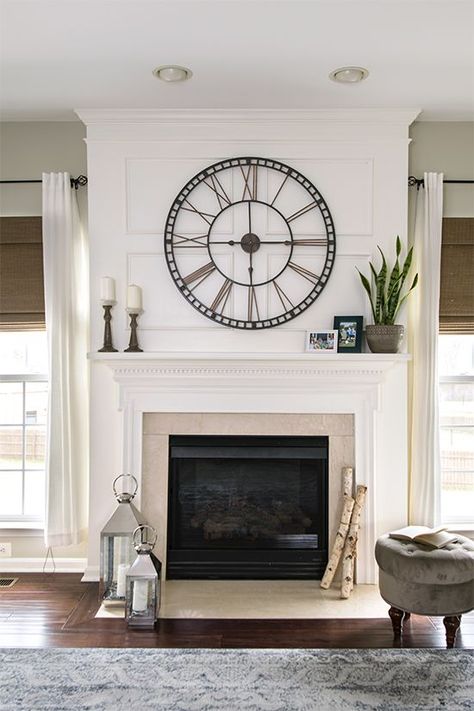 Traditional Mantle with Wainscoting Trim and large clock. Living Room Makeover Reveal. Large Clocks Over Fireplace, Year Round Fireplace Decor, Mantel Decor With Clock, Mantlepiece Decor Living Rooms, Minimalist Mantel Decor, Clock Above Fireplace, Mantelpiece Styling, Mantlepiece Styling, Year Round Mantle Decor