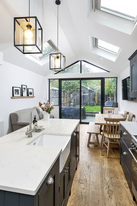 A wonderful extension on this terraced property. The light worktops and white walls let the light bounce around. The skylights and rear glazing allow so much light to flood in too. By Simon Merrony Architects. Rear Extension Ideas, Vaulted Ceiling Kitchen, Light Grey Kitchens, Skylight Kitchen, House Extension Plans, Open Plan Kitchen Diner, Open Plan Kitchen Dining, Open Plan Kitchen Living Room, House Extension Design