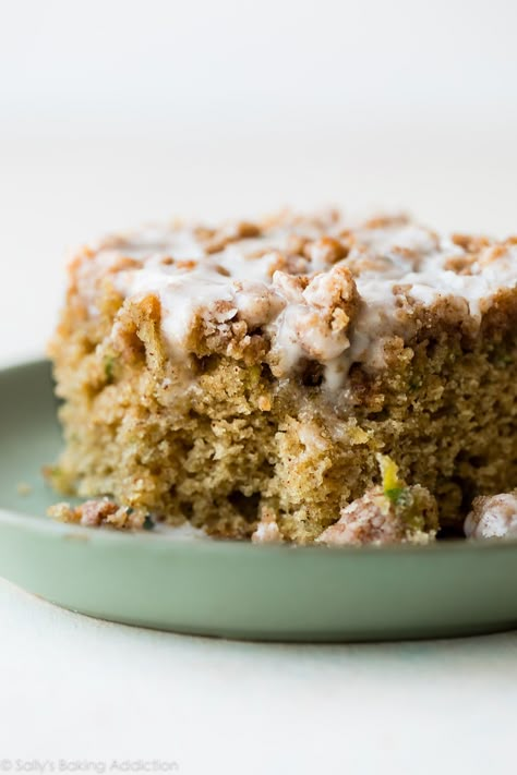 Zucchini crumb cake is moist, spiced with cinnamon, topped with brown sugar crumble, and sweet vanilla icing! You can't even tell you're eating your veggies! Delicious coffee cake recipe on sallysbakingaddiction.com Crumb Cake Muffins, Zucchini Recipes Dessert, Sallys Baking, Crumb Cake Recipe, Sally's Baking, Vanilla Icing, Zucchini Bread Recipes, Zucchini Muffins, Coffee Cakes