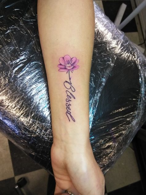 Flower with word stem blessed tattoo on forearm.  @Artsolistattoo Flower Blessed Tattoo, Blessed Flower Tattoo, Flower With Signature Stem Tattoo, Beloved Tattoo With Flowers, Blessed Tattoos For Women, Word Stem Tattoo, Flower With Word Stem Tattoo, Flower Word Tattoo, Flower Tattoo With Words As Stem