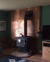 Wood Stove Heat Shield, Wood Stove Surround, Woodburning Stove Fireplace, Wood Burning Stoves Living Room, Cottage Fireplace, Copper Backsplash, Wood Stove Fireplace, Ranch Remodel, Copper Wood