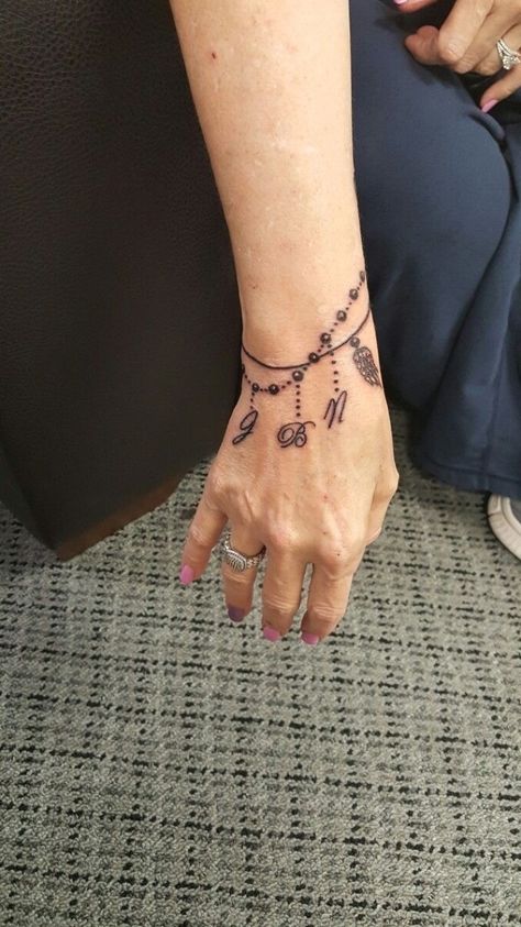 I don't wear bracelets so got this wrist tatoo with all my ... #wristtattoo #mentattoo Charm Bracelet Tattoo, Wrist Tatoo, Wrist Bracelet Tattoo, Ankle Bracelet Tattoo, Armband Tattoos, Anklet Tattoos, Wrist Tattoos For Guys, Tattoo Hand, Arm Band Tattoo