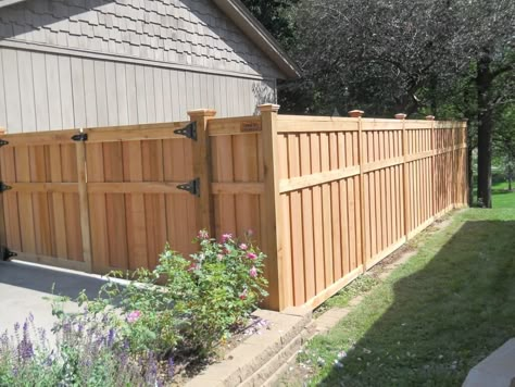 Enhance the beauty of your property with cedar fencing expertly designed and installed by Dakota Unlimited. Short Cedar Fence, Board On Board Privacy Fence, Decorating Fence, Shadowbox Fence, Craftsman Landscaping, Home Fence, Cedar Wood Fence, Cedar Fencing, Fence Design Ideas