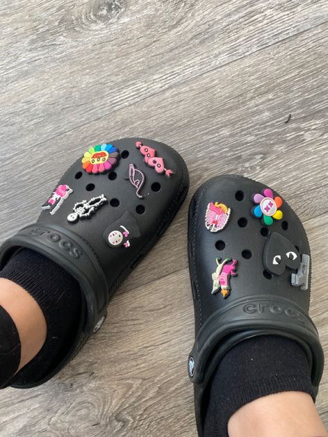 black, pink & rainbow Black Crocs With Pink Charms, Black Croc Outfits, Black Crocs With Charms, Black Crocs Aesthetic, Jibbitz Crocs Ideas, Rainbow Crocs, Croc Jibbitz Ideas, Croc Outfits, Jibbitz Ideas