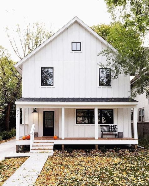 If you're a fan of rustic charm and modern aesthetics, then small modern farmhouse exterior might be what you're looking for. It's a design that combi... Modern Farmhouse Exterior Design, White Farmhouse Exterior, Board And Batten Exterior, Farmhouse Exterior Design, Vertical Siding, Building A Porch, Exterior Design Ideas, Bungalow Homes, Board And Batten Siding