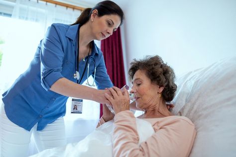 Why Hospice Care Would Choose to Stop Feeding a Patient Homecare Nursing, Excessive Gas, Home Nursing Services, Lying In Bed, Elderly Woman, Hospice Care, Physical Change, Aging In Place, Glass Of Water