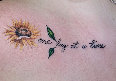 #onedayatatime #sunflower #tattoo #collarbonetat Let It Be Sunflower Tattoo, Sunflower Tattoo Quotes, Let Them Sunflower Tattoo, Sunflower Word Tattoo, Empty Nest Tattoo Ideas, Sunflower Tattoo Collar Bone, Sunflower Tattoo With Quote, Sunflower Wrist Tattoo, Tattoo Therapy