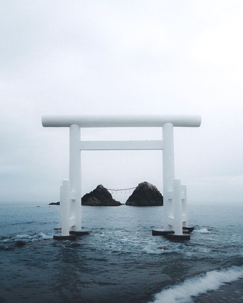 A white torii gate, entrance to a shrine at the shore of a beach Torii Gate, Fukuoka Japan, Japan Aesthetic, Aesthetic Japan, A Frog, Japan Photo, Abandoned Buildings, Fukuoka, Japan Travel