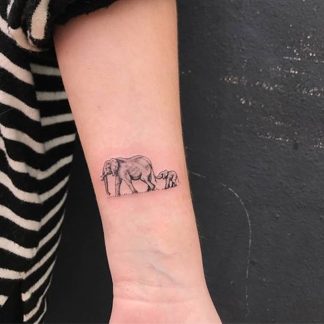 90 Magnificent Elephant Tattoo Designs | TattooAdore Mom Daughter Tattoos Elephant, 2 Elephant Tattoos, Elephant Tattoos Mom And Baby, Elephant With Baby Tattoo, 2 Elephants Tattoo, Elephant Tattoos Mother Daughter, Mom Elephant Tattoo, Mama Elephant Tattoo, Mother And Baby Elephant Tattoo