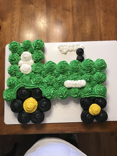 Tractor pull apart cake Farm Pull Apart Cupcakes, Tractor Pull Apart Cupcakes, First Birthday Boy Tractor Theme, Tractor Cupcake Cake, Tractor Cakes, Tractor Cupcakes, Tractor Birthday Cakes, Simple Birthday Cake Designs, John Deere Birthday Party