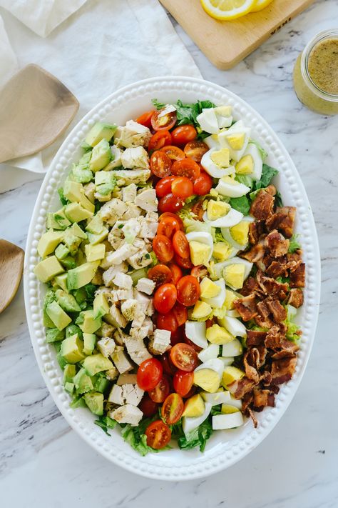 A Cobb Salad is a classic on so many American restaurant menus and an easy salad to make at home.  It is the perfect way to use up leftovers. #dressing #recipe #healthy #classic #salad #cobbsalad #choppedsalad #chicken #avocado #hardboiledeggs Cobb Salad Dip, Classic Cobb Salad Recipe, Easy Salads To Make, Cobb Salad Dressing, Classic Cobb Salad, Salads Recipes For Dinner, Cobb Salad Recipe, Best Salads, Salads For Parties