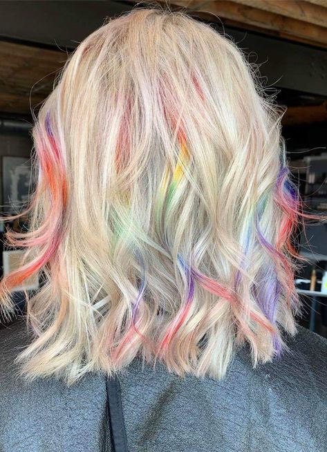 Blonde Hair Rainbow Underneath, Peekaboo Rainbow Hair Blonde, Blond Rainbow Hair, Blonde And Vibrant Hair, Rainbow Streaks In Blonde Hair, Platinum And Vivid Hair, Light Rainbow Hair, Rainbow Underneath Hair Blonde, Rainbow Highlights Short Hair