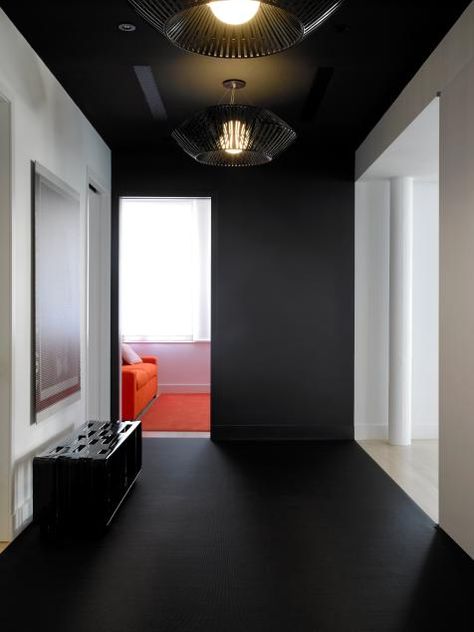 This but gray instead of black Painted Ceiling Hallway, Black Floors, Painting Cafe, Black Hallway, Cafe Interiors, Black Painted Walls, Wall Clock Unique, Black Rooms, Oversized Wall Clock