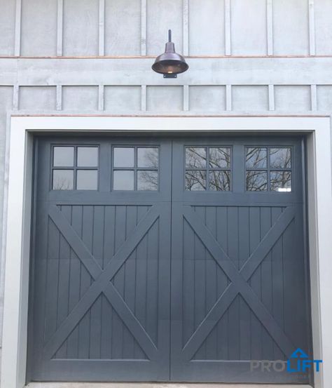 Barn Door Garage, Wooden Garage Door, Carriage Style Garage, Front Yard Courtyard, Unique Garage Doors, Carriage Door, Carriage Style Garage Doors, Barn Style Garage, Faux Wood Garage Door