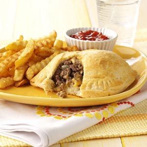 Cheeseburger Pockets Recipe from Taste of Home -- shared by Pat Chambless of Crowder, Oklahoma Cheeseburger Pockets, Cheese Burger, Beef Dishes, Ground Beef Recipes, I Love Food, Cheeseburger, Lasagna, Ground Beef, Beef Recipes