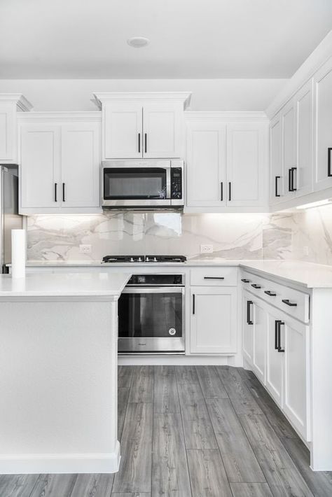 Kitchen With White Cabinets And Black Hardware, White Kitchen Cabinets With Black Handles Hardware, White Kitchen Cabinets With Peninsula, White Cabinets Kitchen With Black Hardware, Kitchen Cabinets White And Black, All White Kitchen Small, Kitchen Inspirations Black And White, Lake Kitchen Cabinets, Kitchen White Cabinets Grey Floor