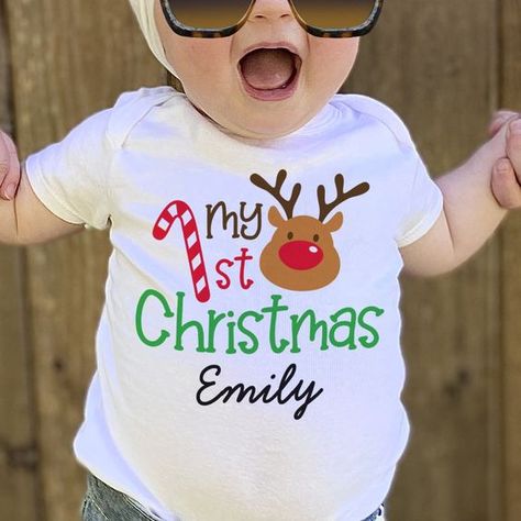 My 1st Christmas Personalized Kid Baby T-Shirt Christmas t shirt #christmastshirt T shirt #tshirt t-shirt #t_shirt t shirts #tshirts t-shirts #t_shirts T shirt design #tshirtdesign T-shirt designs #t_shirtdesign T shirts designs #tshirtsdesigns 4.38 Baby Christmas Shirt, Tshirt Prints, My 1st Christmas, Baby's 1st Christmas, Baby Reindeer, Christmas T Shirt Design, Top Baby Products, Birthday Design, Baby T Shirt