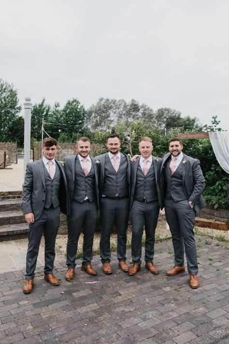 Charcoal Gray Suit Groomsmen, Groomsmen Attire Rose Gold Wedding, Dark Gray Suit With Pink Tie, Gray And Pink Groomsmen Attire, Grey And Pink Wedding Suit, Grey Suit Pink Tie Wedding, Grey Suit For Groomsmen, Groomsmen Attire For Dusty Rose Wedding, Grey Suit With Dusty Rose Tie