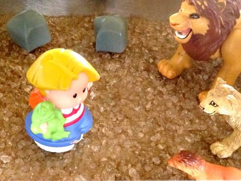 Using Sensory Bins to Teach the Bible - In All You Do Bible Story Sensory Bins, Daniel And The Lions Den, Toddler Bible Lessons, Toddler Sunday School, Toddler Bible, Daniel In The Lion's Den, Daniel And The Lions, Preschool Bible Lessons, Lions Den