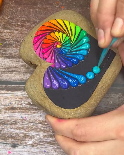 A heart-shaped stone gets rainbow colors | rock, rainbow | A heart-shaped stone gets rainbow colors | By MetDaan Creative Heart Shape Rock Painting Ideas, Rainbows Painted On Rocks, Heart Shaped Painted Rocks Ideas, Heart Rocks Painted, Heart Shaped Rock Painting Ideas, Cslp 2025, Rainbow Rock Painting, Reindeer Farm, Heart Shaped Rocks