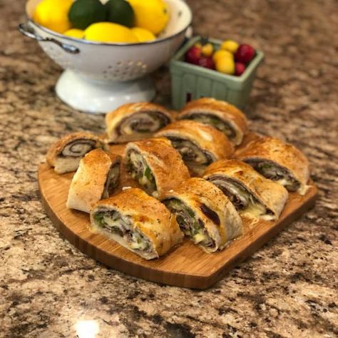 Philly Cheesesteak Stromboli Cheesesteak Stromboli Recipe, Dinner 321, Cheesesteak Stromboli, Crock Pot Pizza, Cheez Whiz, Stromboli Recipe, Sautéed Mushrooms, Appetizer Sandwiches, Banana Peppers