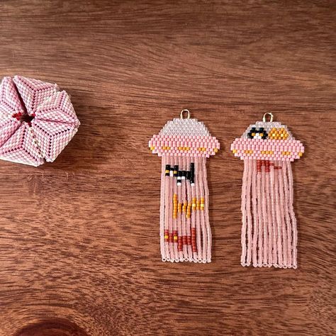 This picture of these cuties was sitting in my phone and I just had to show you 🧡 © Copyright 2022 I do not consent to my designs being… | Instagram Selling Stand, Brick Stitch Earrings, Seed Bead Patterns, Beaded Earrings Patterns, Pride Merch, Beaded Crafts, Bead Loom, Beaded Animals, Beading Projects