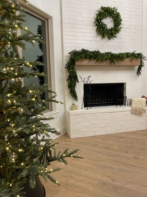 Christmas decor, christmas garland, holiday decor Garland Tv Stand, Chimney Christmas Decor, Tv Stand Christmas, Norfolk Pine, Minimal Christmas, Christmas Garland, Decor Christmas, Norfolk, Tv Stand