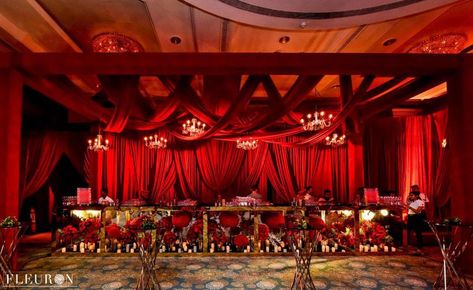 Photo By Fleuron India - Decorators Rajwada Wedding Decor, Rajwada Theme Wedding Decor, Sabyasachi Wedding Decor, Red And Gold Mandap, Red Stage Decoration, Wedding Buffet Table Decor, Red Wedding Receptions, Marriage Hall Decoration, Wedding Buffet Table