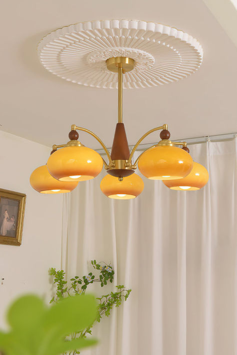 Add a touch of elegance and sophistication to your space with the Retro Calliope Chandelier from Mooijane. Industry experts designed this chandelier, which features a sleek, modern design that enhances the ambiance of any room. Made from premium materials, it provides reliable and long-lasting lighting.