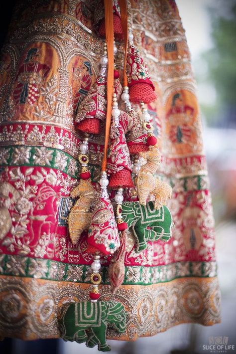 Pretty colorful gota lehenga with cute elephant latkans for wedding. See more on wedmegood.com  #wedmegood #indianwedding  #indianbride #latkans #tassels #bridallehenga #lehenga #lehengacholi Latkan Design, Tassels Fashion Clothing, Designer Tassels, Saree Tassels Designs, Saree Tassels, Best Blouse Designs, Tassels Fashion, Wedding Lehenga, Indian Wedding Outfits