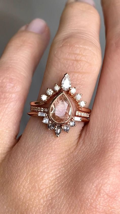 model wearing sunstone engagement ring with white diamond stacking bands Sunstone Engagement Ring, Engagement Ring Stack, Pear Shaped Engagement Ring, Oregon Sunstone, Pear Shaped Engagement Rings, Stacking Bands, The Perfect Engagement Ring, Wedding Accessories Jewelry, Ring Stack