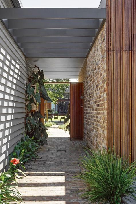 A clever layout and upcycled materials enabled a NSW architect to double the size of this weatherboard cottage home without compromising its charm. Paved Walkway, Landscape Courtyard, Weatherboard Cottage, Brick Walkway, Recycled Brick, Brick Paving, Front Courtyard, Cottage Renovation, Internal Courtyard