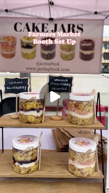 Jar’d Up by CK ✿ Cake Jars on Instagram: "my weekly set up for my farmers markets 🩷  Used to take me forever to set up by myself, but now I don’t even take 30 minutes!   #jardupbyck #cake #cakes #cakejar #cakejars #anaheim #orangecounty #oc #thingstodoinoc #farmersmarket #entrepreneur #entrepreneurship #smallbusiness #smallbusinessowner #smallbusinesssupport #homebaking #homebaker #homebakery #farmersmarketinspo #boothsetup #booth" Farmers Market Product Ideas, Cake Vendor Booth Display Ideas, Pop Up Bakery Ideas, Cake Stall Display Ideas, Baked Goods To Sell At Farmers Market, Farmers Market Display Baked Goods, Farmers Market Set Up, Farmers Market Bakery Display, Bakery Farmers Market Display