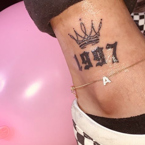 #tattoo #year #yeartattoo #1997 #A #crown #queencrown 1997 Tattoo Ideas Women, Crown Hand Tattoos For Women, Mini Crown Tattoo, Year Tattoo Ideas, 1999 Tattoo Ideas, Small Crown Tattoos For Women Queens, Tattoos Of Crowns For Women, 1997 Tattoo, 1997 Tattoo Ideas