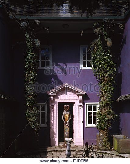 Surrealist sculpture beside front door of purple house formerly owned by surrealist Edward James - Stock Image Monkton House, Surrealist Sculpture, Purple House, Purple Home, Chichester, Stock Photography, Front Door, Photo Image, Vector Illustration