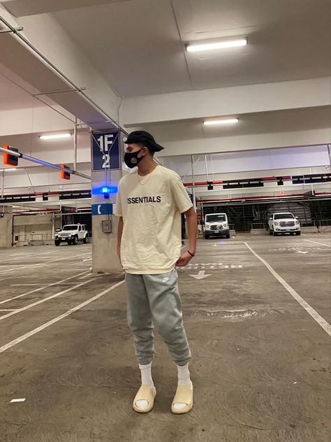 Streetwear, beige, nightlife, style, aesthetic Guys Chill Outfits, Mens Yeezy Slide Outfit, Black Yeezy Slides Outfit For Men, Yezzy Outfits Men, Men Slides Outfit, Mens Chill Outfits, Chill Fits For Men, Chill Outfit Men, Yeezy Slides Outfit For Men