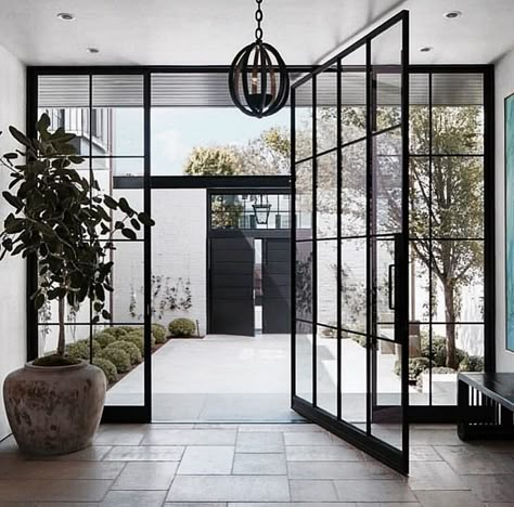 San Francisco Interiors, Steel Windows, Interior Design Awards, Casas Coloniales, Pivot Doors, White Brick, House Doors, Front Entrance, Residential Interior Design