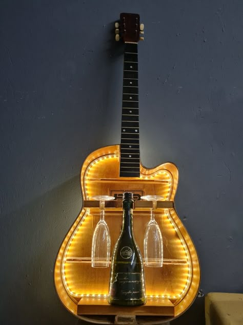 Guitar Diy Projects, Old Guitar Ideas, Guitar Lamp Diy, Guitar Lamp, Guitar Shelf, Event Space Design, Guitar Light, Wooden Guitar Stand, Music Lamp