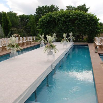 Unique Wedding Ceremony aisle over a pool | Event Rents Poolside Wedding Ceremony, Pool Events, Wedding Ceremony Aisle, Unique Wedding Ceremony, Gallery Event, Party Design Ideas, Backyard Wedding Ceremony, Wedding Isles, Ceremony Aisle