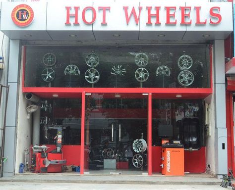 http://www.buzznoida.com/business/automotive-vehicle/tyres-shops-tyre-showrooms/11673.aspx Hot Wheels a Multi Brand Tyre Shop Noida (Bridgestone Tyre Noida / Michelin Tyre Noida & Car Alloy Wheels) 9717841595 Shop Counter Design, Tire Shop, Bridgestone Tires, Closet Shoe, Business Club, Battery Shop, Attention Grabbers, Closet Shoe Storage, Modern Bathroom Tile