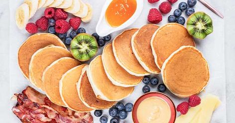 A list of toppings and syrups to make your family breakfast epic. Strawberry Pancake Syrup, Egg Free Pancakes, Pancake Bar, Strawberry Pancakes, Gluten Free Flour Mix, Cinnamon Roll Pancakes, Breakfast Specials, Blueberry Syrup, Perfect Pancakes