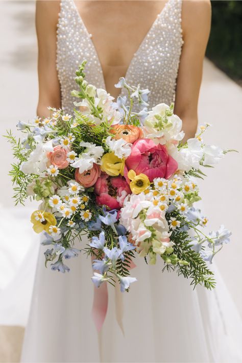 Romee Willow Florals created this colorful bridal bouquet for Alex & Aeryn's spring wedding at Greenhouse Loft. The bride wanted her bouquet to look colorful, loose, natural and whimsical, like a bouquet of wildflowers. They gathered inspiration from one of their favorite Wes Anderson movies, Moonrise Kingdom. Learn more details and see photos from their spring wedding on the blog. Wedding planner: Naturally Yours Events Photography: Ed and Aileen Photography Wildflower Wedding Theme Bouquet, Multicolor Bouquet Wedding, Garden Wedding Bouquet Spring, Pastel Rainbow Bouquet, Wedding Flowers Multicolor, Spring Floral Wedding Bouquet, Whimsical Garden Wedding Bouquet, May Wedding Bouquet Brides, Meadow Wedding Bouquet