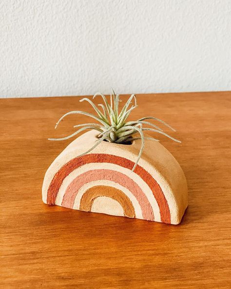 Showcase your air plants with an Air Dry Clay Rainbow Vase! This DIY project combines vibrant, handcrafted colors with functional design, creating a charming and eye-catching display for your air plants. Perfect for adding a touch of whimsy and color to your home decor. #RainbowVase #AirDryClay #AirPlantDisplay #HandmadeDecor #DIYProjects #ColorfulHome Dry Clay Crafts, Air Dry Clay Crafts, Rainbow Vase, Cactus Ring, Mother's Day Projects, Air Plant Display, Air Dry Clay Projects, Clay Crafts Air Dry, Easter Projects