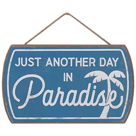 PRICES MAY VARY. Open Road Brands official product: Paradise is wherever your people are! Use this lovely blue sign to add a nautical touch to your home. Fun Vintage Sign: With a sweet palm tree illustration and stylish typography, this wall art is a must-have addition to your other beach-themed decor. Material: This must-have wall decor is made of MDF wood with a string for quick and easy display. Made in the USA. Places to Use: This simple but commanding sign will make a statement in your beac Beachy Living Room, Just Another Day In Paradise, Beach Signs Wooden, House Lake, Plain Wall, Wood Signs Sayings, Another Day In Paradise, Fa Fal, Beach Theme Decor