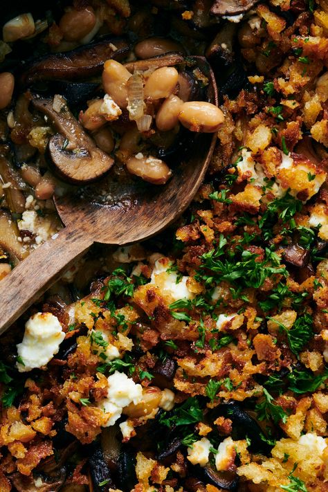 Baked Mushrooms and White Beans With Buttery Bread Crumbs Recipe - NYT Cooking Bread Crumbs Recipe, White Bean Recipes, Baked Mushrooms, Vegetarian Main Course, Roasted Meat, Nyt Cooking, Bean Casserole, White Beans, Meatless Meals